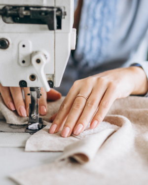 Woman tailor working at the sewing factory